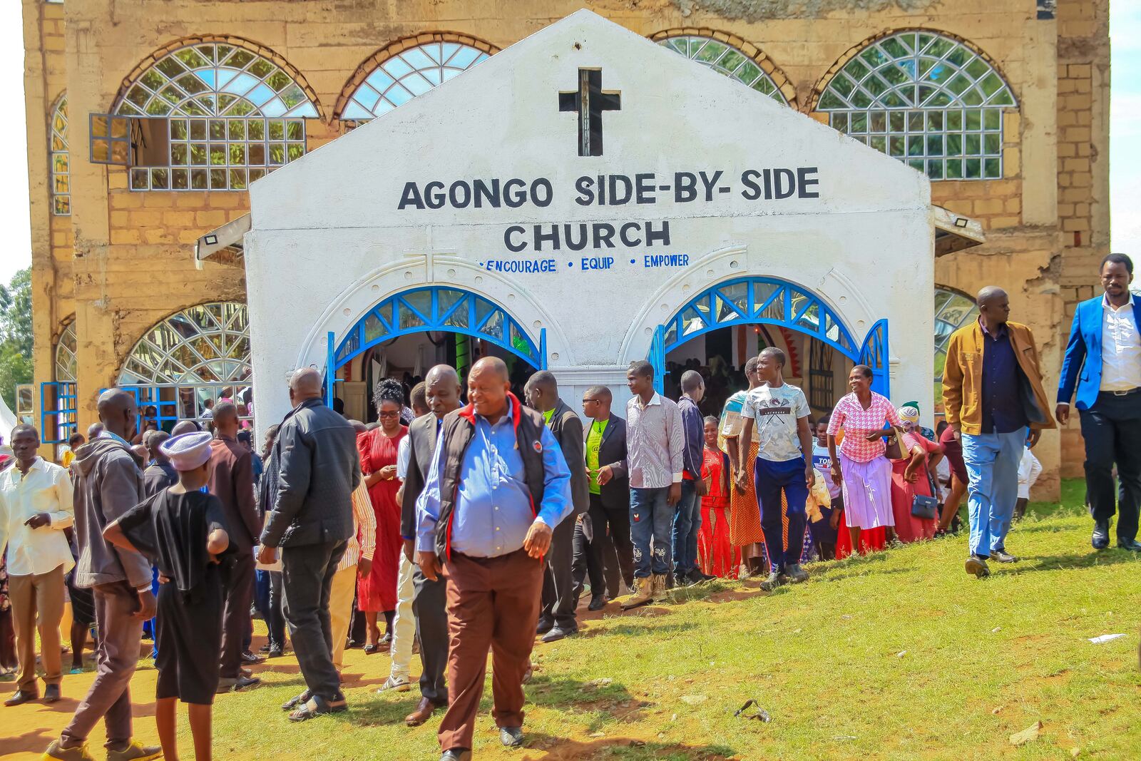 Congregation gathered outside the church entrance