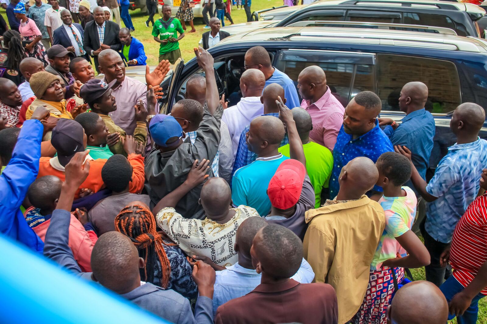 Church members gathered around a visiting guest