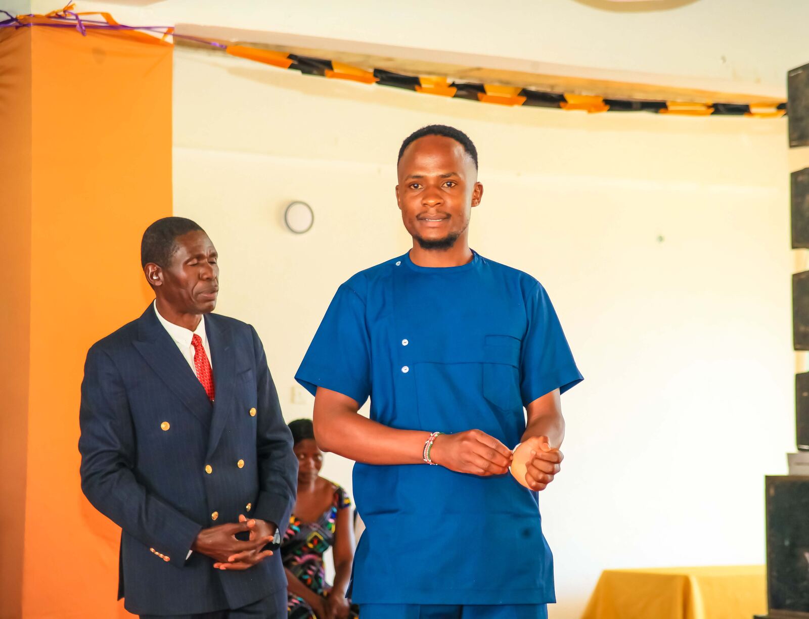 Church members sharing a moment on the platform