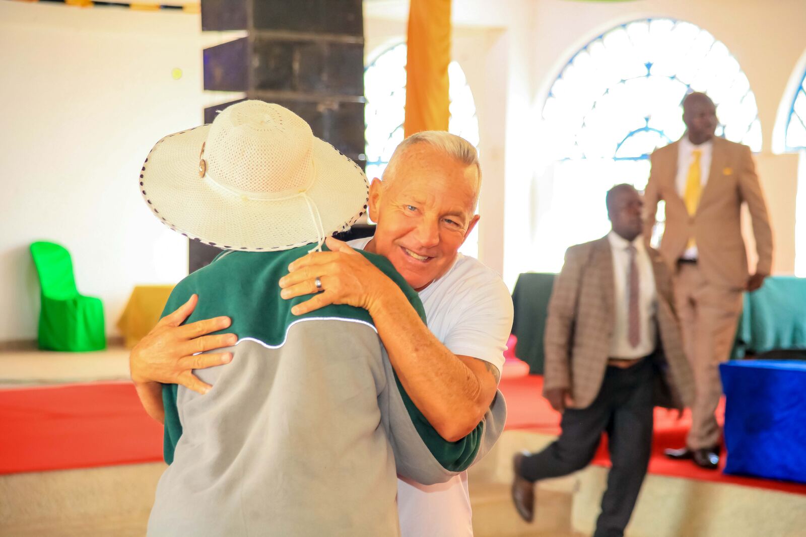 Church members embracing in fellowship