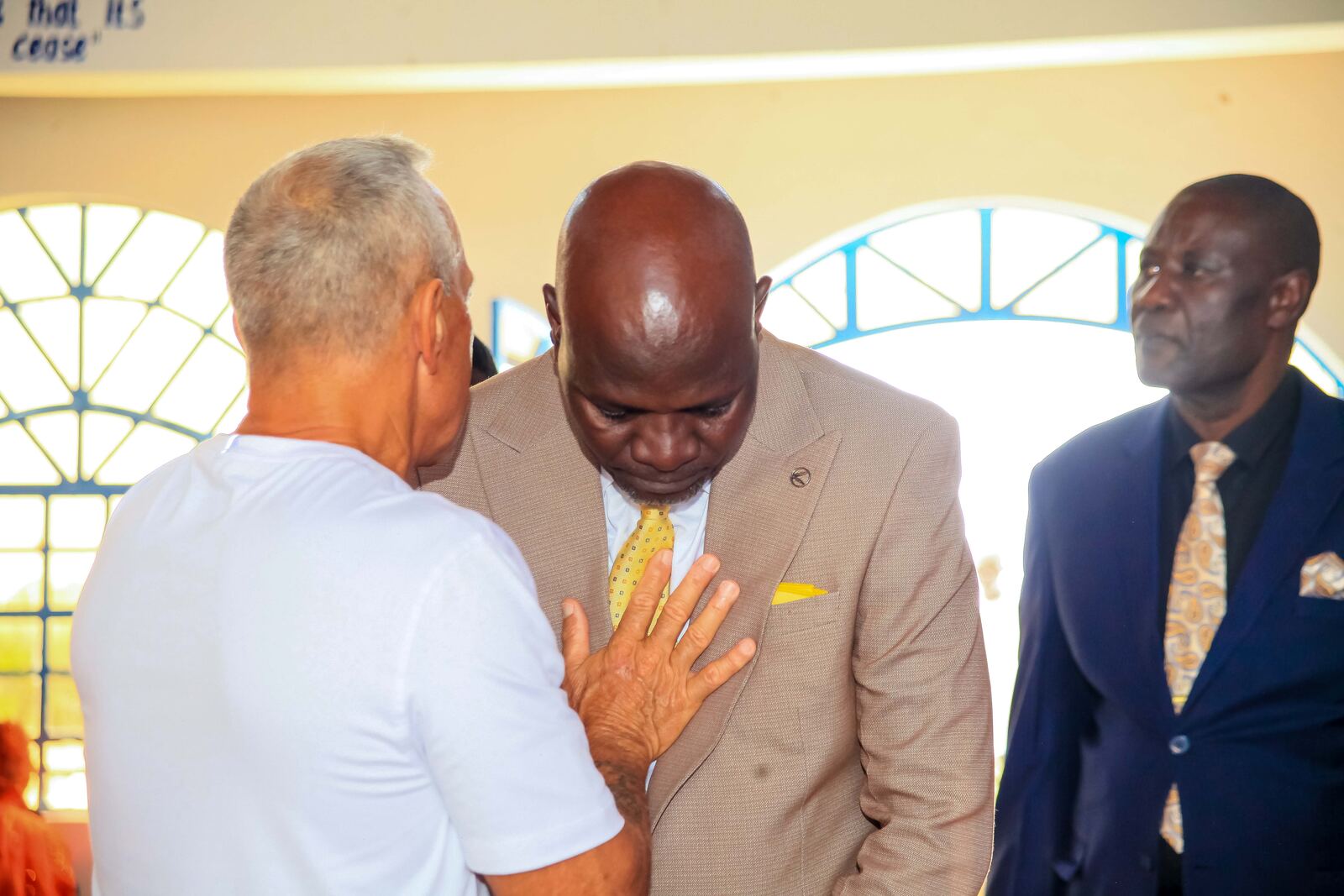 Prayer and ministry during a church gathering
