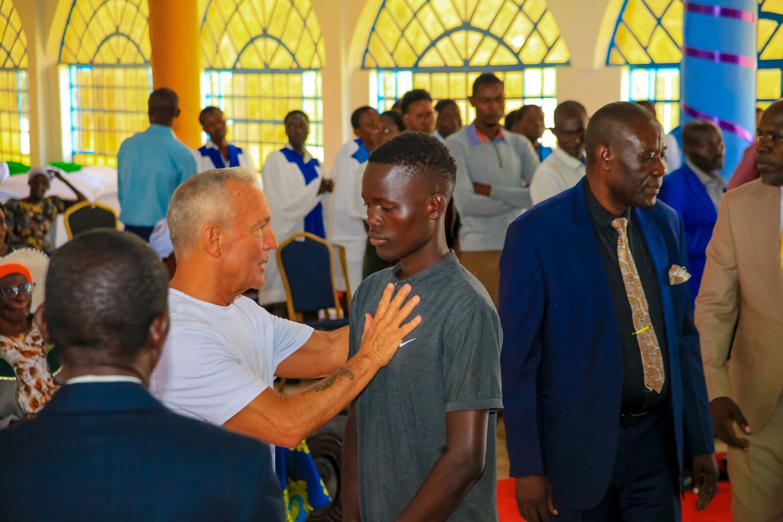 Prayer and ministry during a church gathering