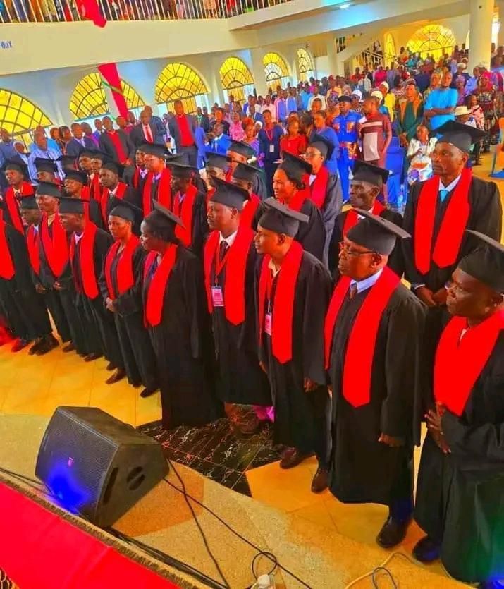 Africa Bible College graduation ceremony with rows of graduates