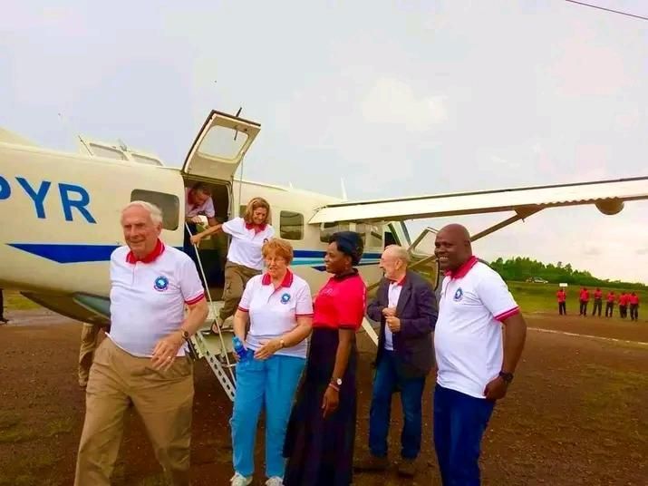 International partners and mission team arriving by aircraft for ministry outreach